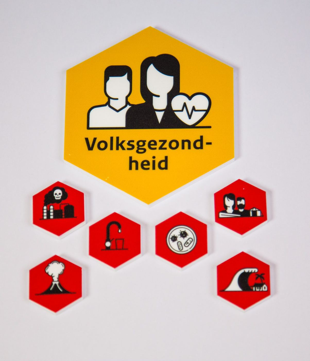 Gele zeshoek Volksgezondheid met rode magneten voor calamiteiten